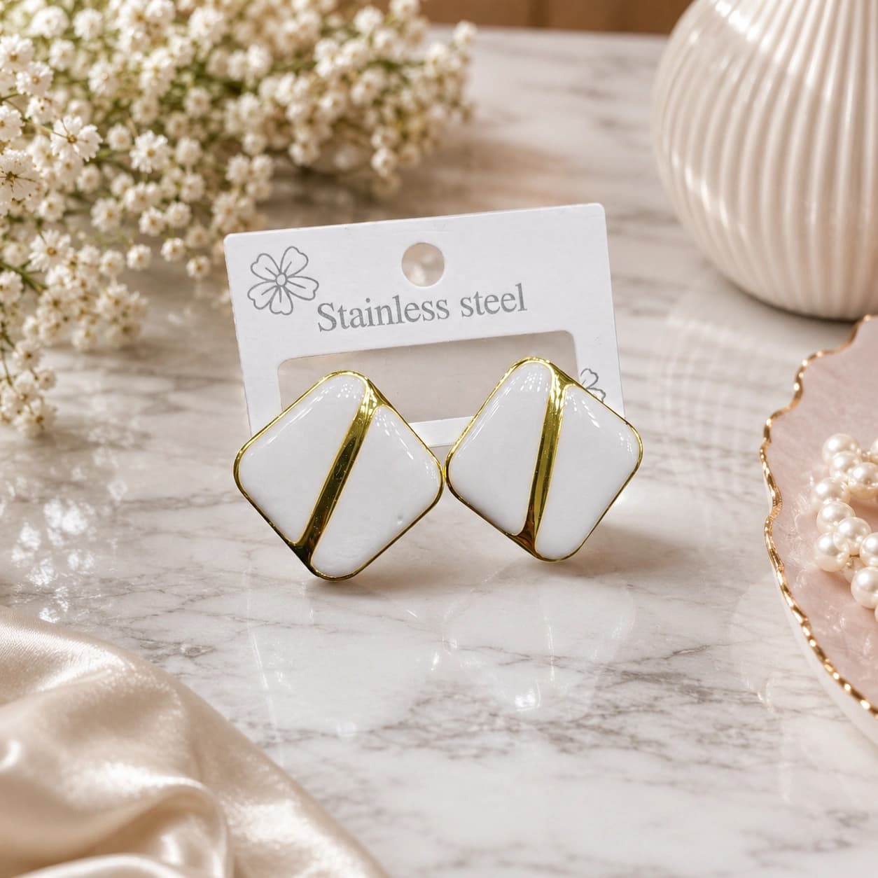 Celeste Ivory Gold Geometric Stud Earrings by Soni De Nakhre