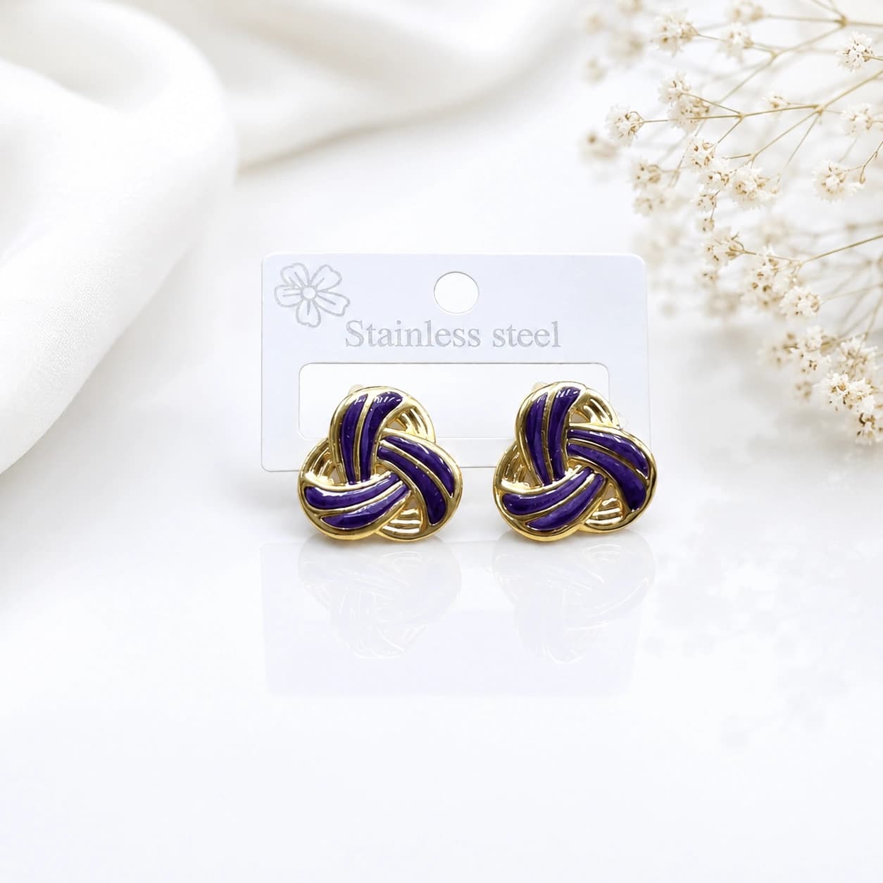 Celeste Purple Gold Interwoven Knot Stud Earrings by Soni De Nakhre